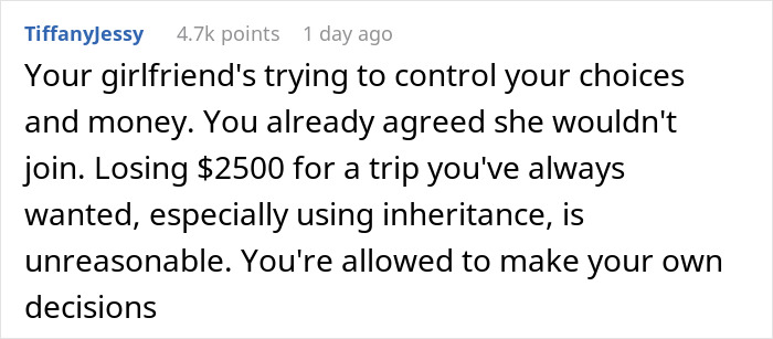 Man accused of supporting transphobia at Harry Potter Wizarding World location, standing near themed castle and crowd.