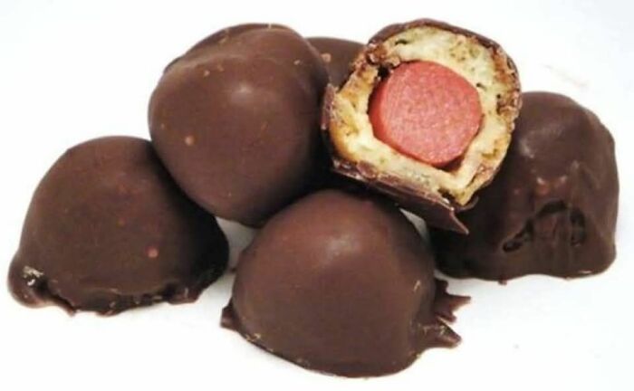 Chocolate-covered candy with a sausage center, an example of gross foods that might cause loss of appetite.