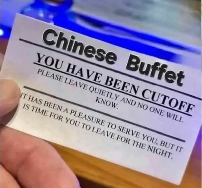 Hand holding a blunt Chinese Buffet card indicating cutoff, related to foods that are so gross and may cause loss of appetite.