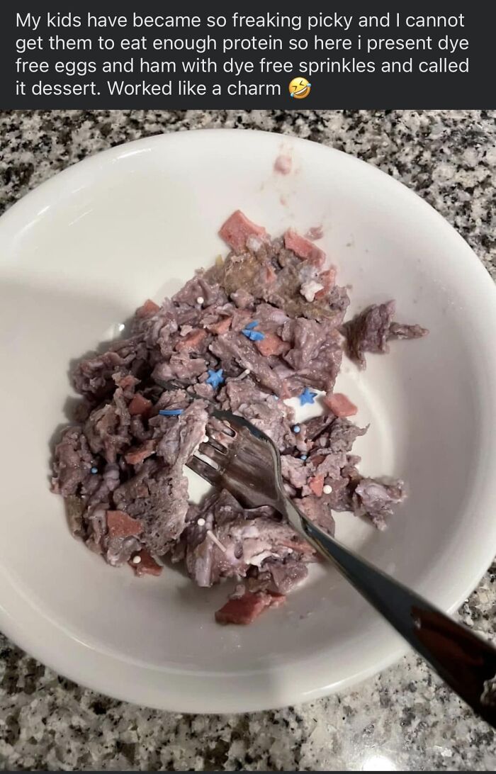 Grayish-purple eggs and ham with blue and white sprinkles in a bowl, an example of gross foods affecting appetite.
