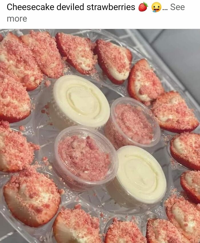 Tray of deviled strawberries topped with pink crumbs and containers of creamy dip, an example of gross foods.
