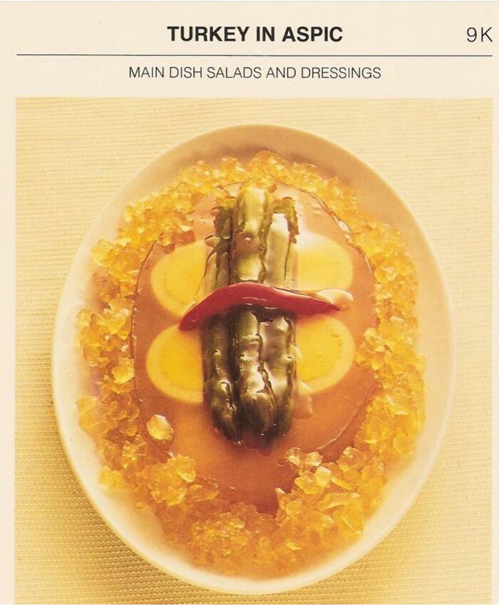 Turkey in aspic dish with eggs, pickles, and jelly, shown as an example of gross foods that might lose your appetite.