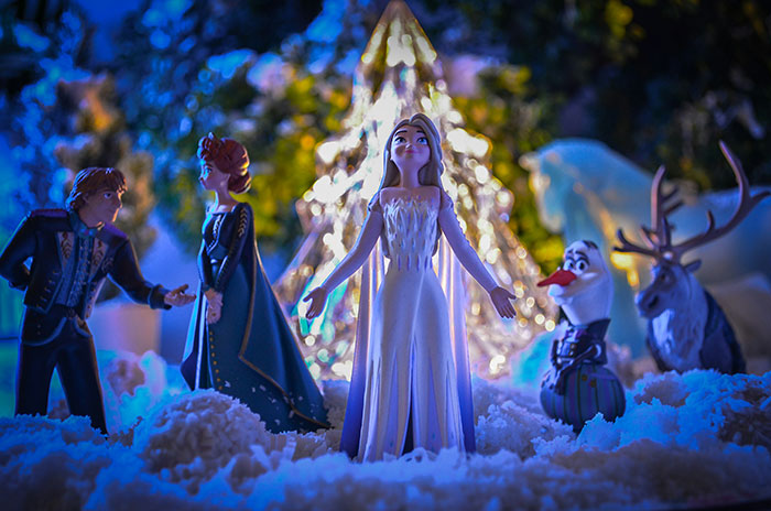 Frozen figurines in a snowy setting, illustrating the wildest celebrity rumors in a magical winter scene.