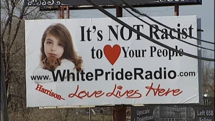 Billboard showing a girl with a dog, promoting a controversial message, situated in a creepy and chilling spot in the U.S.