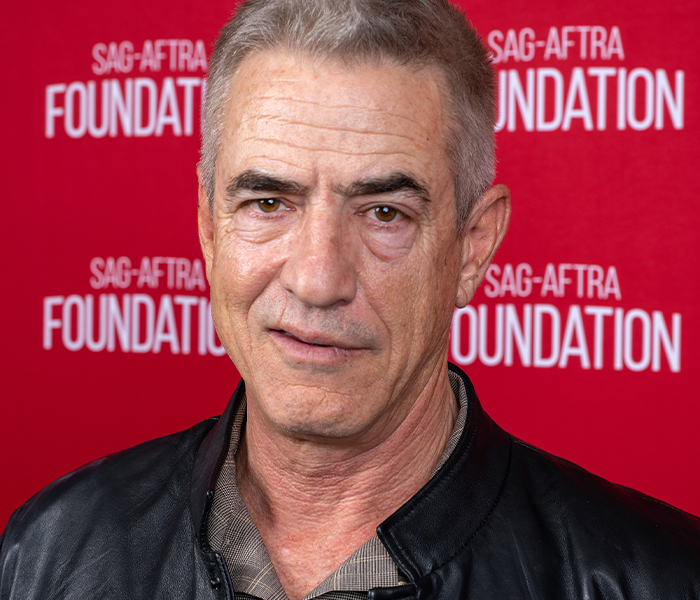 Middle-aged man with prominent facial features posing at SAG-AFTRA Foundation event, highlighting celebrity body anomalies.