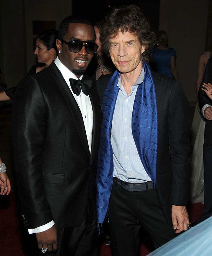 Diddy and Mick Jagger posing together at an event, highlighting celebs mentioned in trial witness accounts.