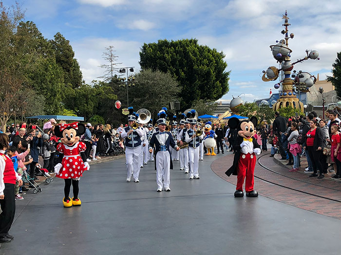 Disneyland wedding interrupted as staff notice the bride is a 9-year-old girl during parade with Mickey and Minnie.