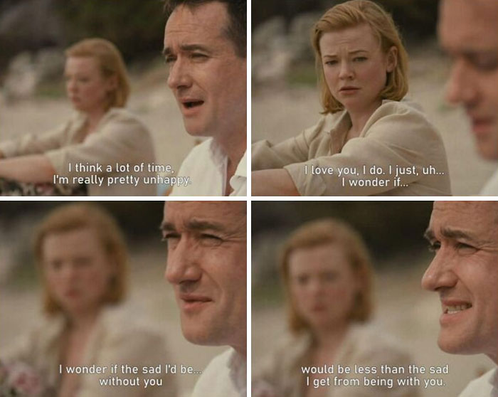 Couple having a serious conversation on a beach, illustrating that relationships can be emotionally exhausting and complex.