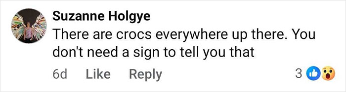 Comment on a post about a man and child fishing on a seemingly quiet river, mentioning crocs nearby causing heated reactions. Comment on a post about a man and child fishing on a seemingly quiet river, mentioning crocs nearby causing heated reactions.