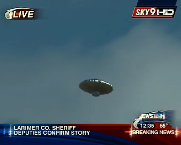 UFO-shaped balloon captured live by news helicopter during Balloon Boy family controversy in Larimer County breaking news coverage.