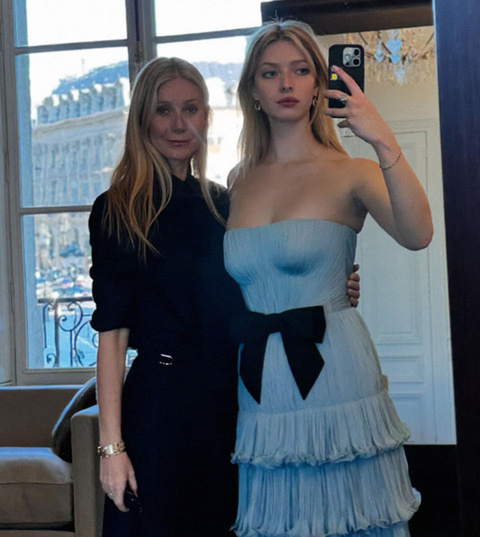 Apple Martin and Gwyneth Paltrow posing for a mirror selfie, highlighting the roasting over topless cooking post backlash online. Apple Martin and Gwyneth Paltrow posing for a mirror selfie, highlighting the roasting over topless cooking post backlash online.
