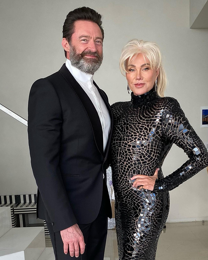 Hugh Jackman and his new girlfriend posing together indoors, highlighting their long 17-year history.