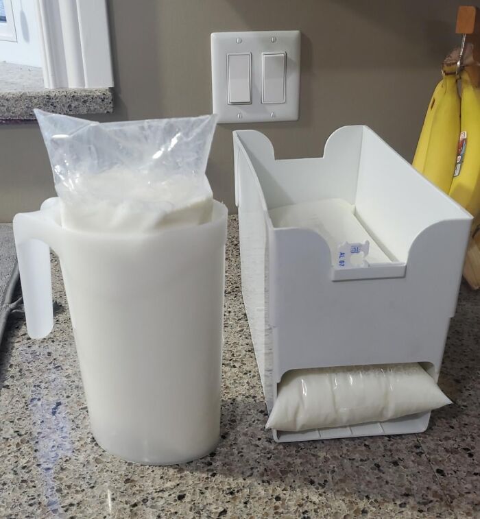 Plastic bag filled with milk and dispenser on kitchen counter, showing something totally normal that would shock most Americans.
