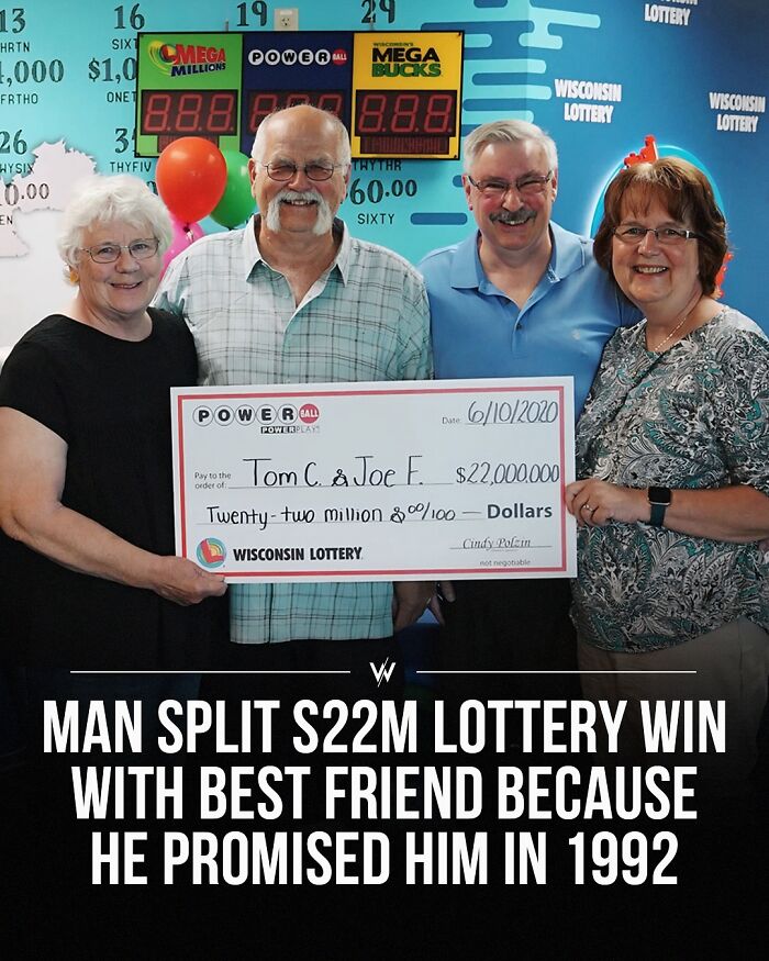 Four people smiling and holding a large lottery check, illustrating interesting short stories about luck and friendship.