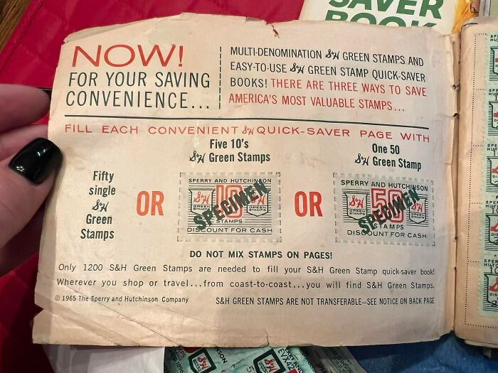 Vintage S&H Green Stamps collector book found hidden in a wall, showcasing unexpected items people discover in homes.