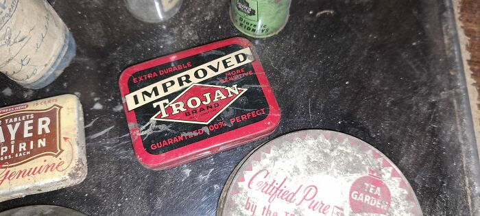 Vintage items unexpectedly found in walls and other hidden places in people’s homes on a dusty surface.