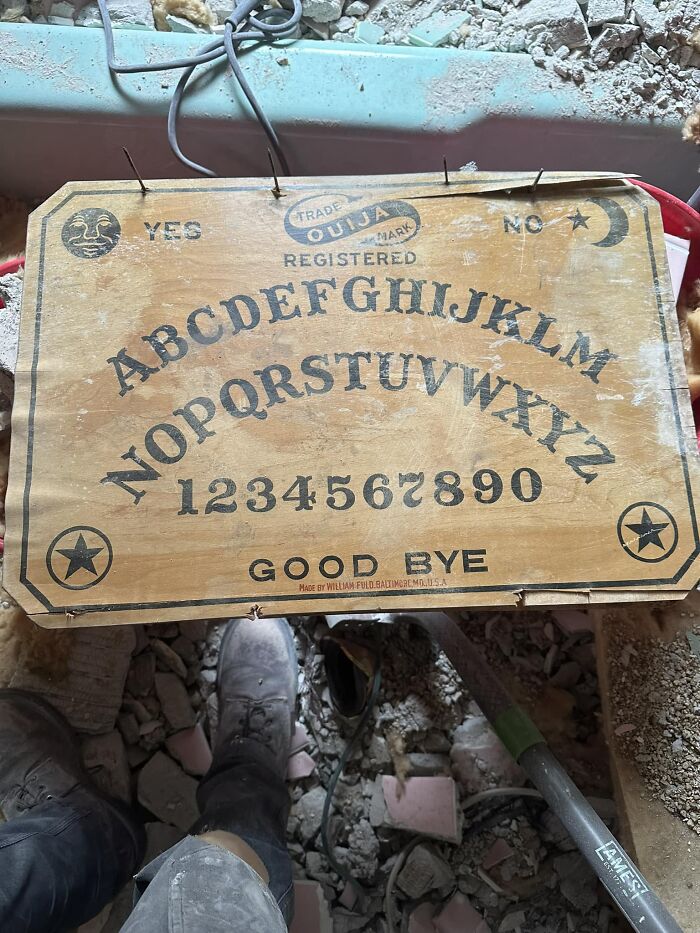 Vintage Ouija board found hidden in wall among other unexpected things in homes during renovation work.