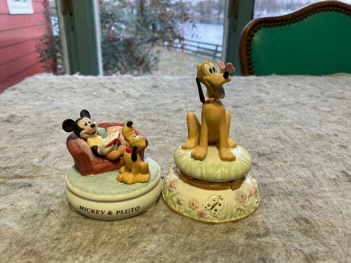Collectible Mickey and Pluto figurines found in walls and other hidden places in people's homes.