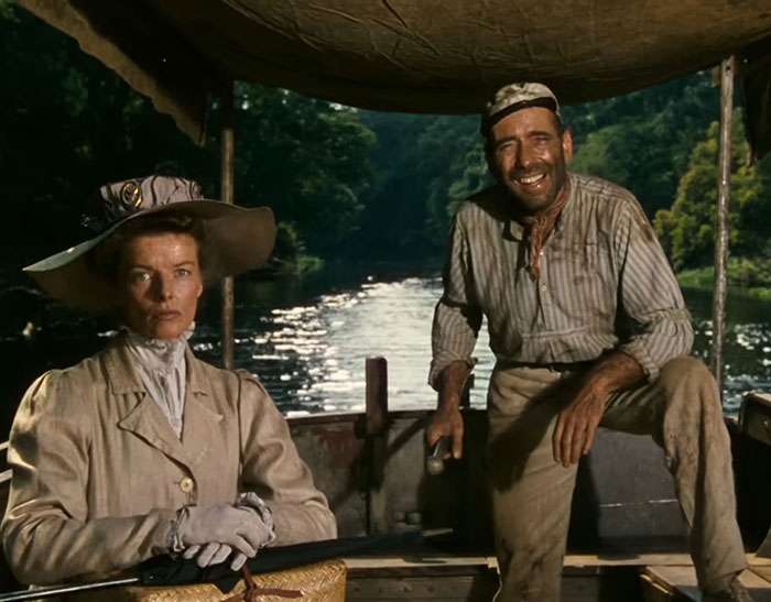 Two people on a boat in a river surrounded by greenery, illustrating facts to keep the brain active and healthy.