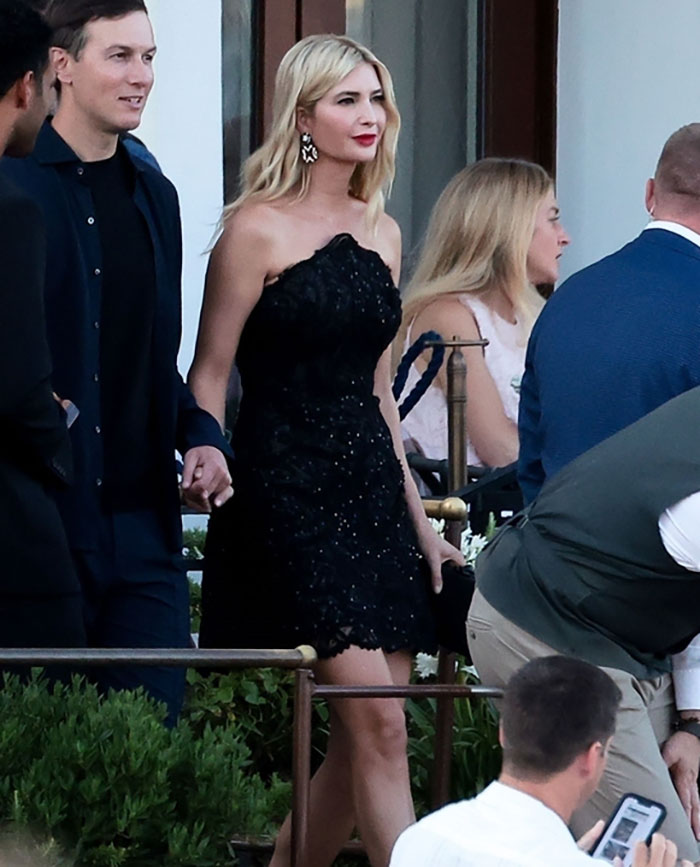 Lauren S&aacute;nchez dressed in a chic black dress at Jeff Bezos's pajama-themed afterparty with racy revealing looks.