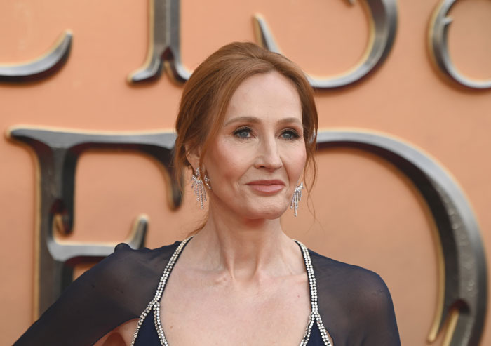 J.K. Rowling at event, wearing black dress and earrings, amid controversy over Harry Potter cash funding anti-trans project. J.K. Rowling at event, wearing black dress and earrings, amid controversy over Harry Potter cash funding anti-trans project.