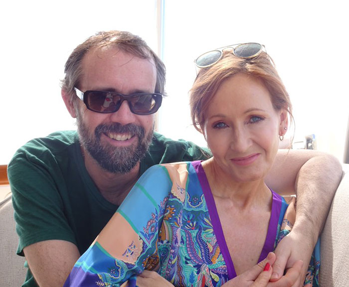 Stephen Fry smiling with sunglasses and J.K. Rowling in a colorful dress, highlighting Stephen Fry and J.K. Rowling SEO keywords.