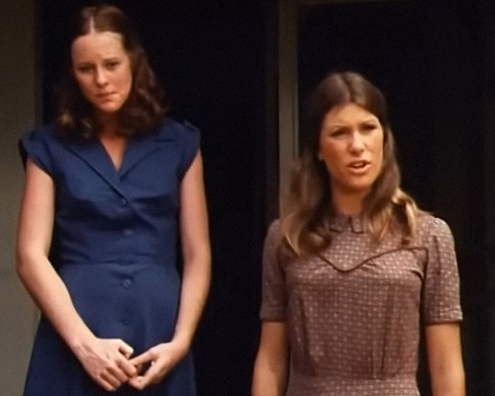 Two 70s TV actresses standing outdoors, wearing vintage dresses, showcasing classic style from the era. Two 70s TV actresses standing outdoors, wearing vintage dresses, showcasing classic style from the era.