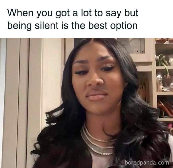 Young woman with long black hair and layered necklaces looking thoughtful, illustrating a cute and wholesome post moment.