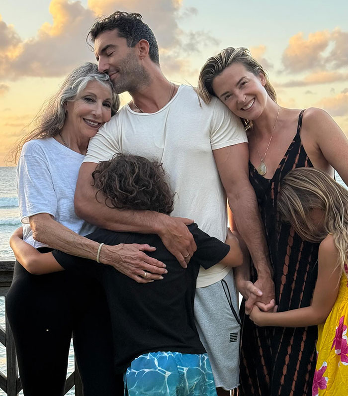 Blake Lively and family sharing a tender moment outdoors, highlighting emotions tied to Justin Baldoni lawsuit dismissal.