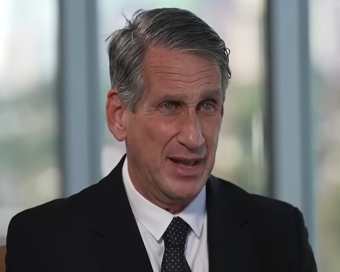 Lawyer speaking in an office setting, addressing Justin Baldoni lawsuit dismissal and Blake Lively legal response.