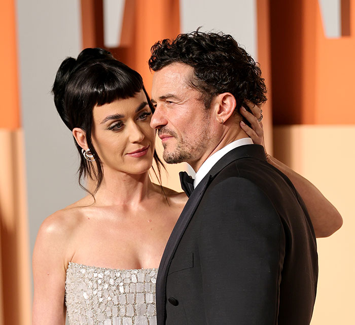 Katy Perry and Orlando Bloom together at an event, highlighting their engagement and recent split news. Katy Perry and Orlando Bloom together at an event, highlighting their engagement and recent split news.
