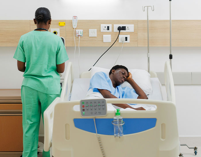 Patient resting in hospital bed with nurse attending, illustrating lawyers immediately knew case was unwinnable scenario.