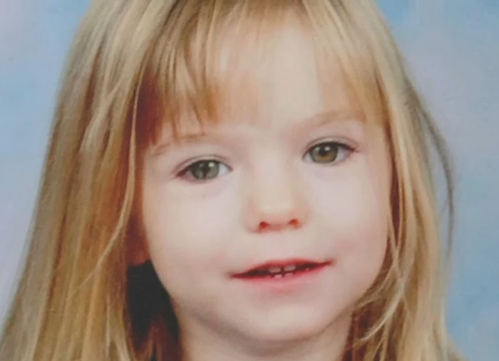 Portrait of a young girl with long blonde hair, related to Madeleine McCann detectives discovering two buried weapons.