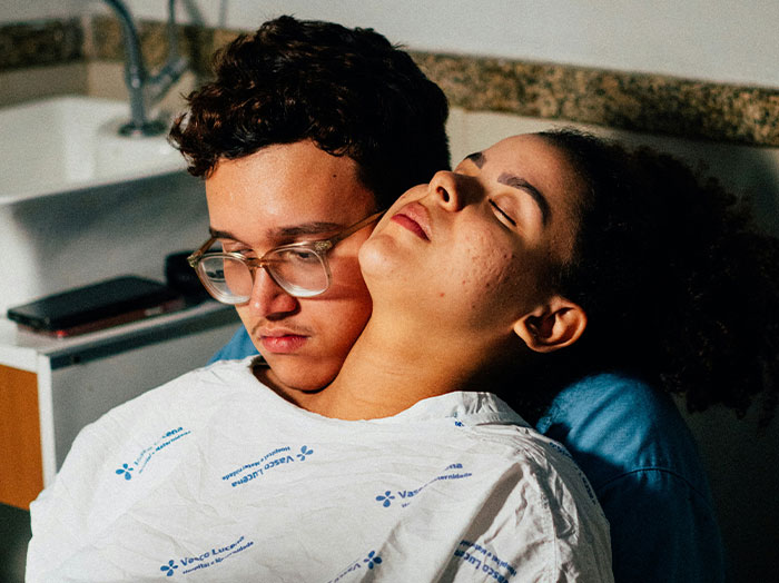 A couple in an intimate embrace, capturing moments when men made women feel special and stand out romantically.