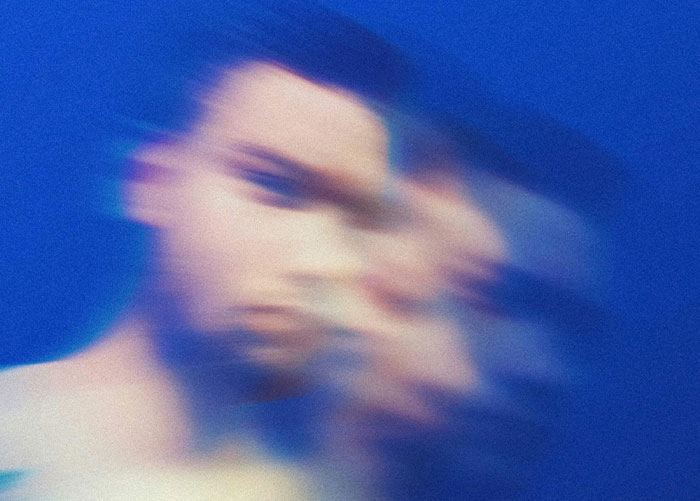 Blurred artistic portrait of a person representing confusion or uncertainty about healthy foods to skip eating.