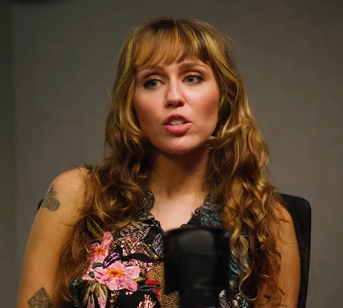 Miley Cyrus speaking in an interview, discussing being fired from kids movie over cake shaped like male genitalia.