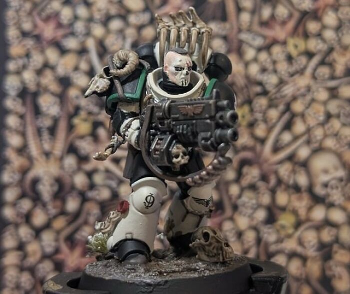 Warhammer miniature figure painted with skull motifs, showcasing a hobby that can give netizens the ick.