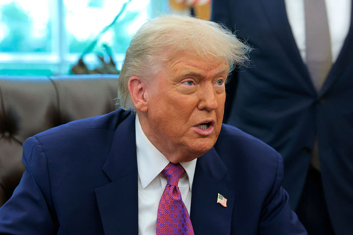 Former president speaking in an office setting, symbolizing more cosmic chaos and Nostradamus predictions for 2025.