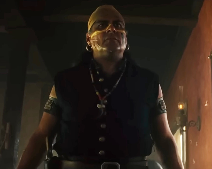 Actor Chris Pratt in a dark outfit with face paint, sparking heated reactions over tribute to Parks and Rec co-star.