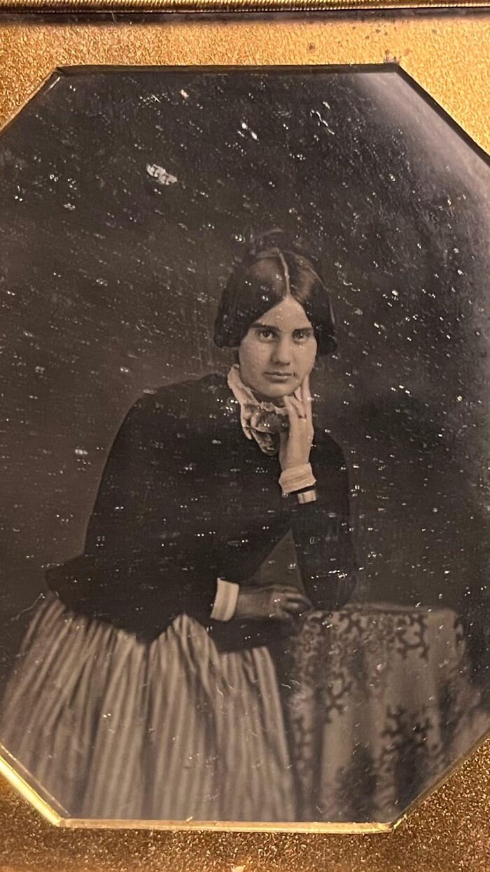 Vintage photo of a woman in 19th-century attire found in walls, an intriguing discovery that really confused people.