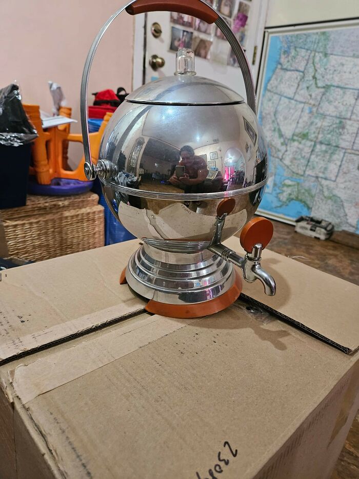 Vintage metal dispenser found inside a wall, one of the things people found in their walls or other places that really confused them.