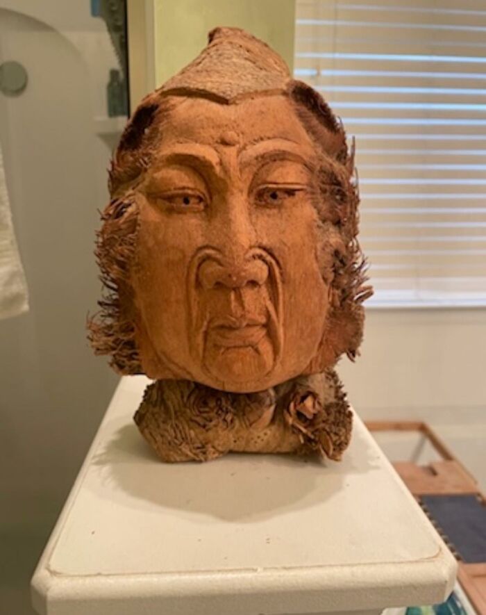 Wooden carved face sculpture found in walls or other places that really confused people with its detailed expression.