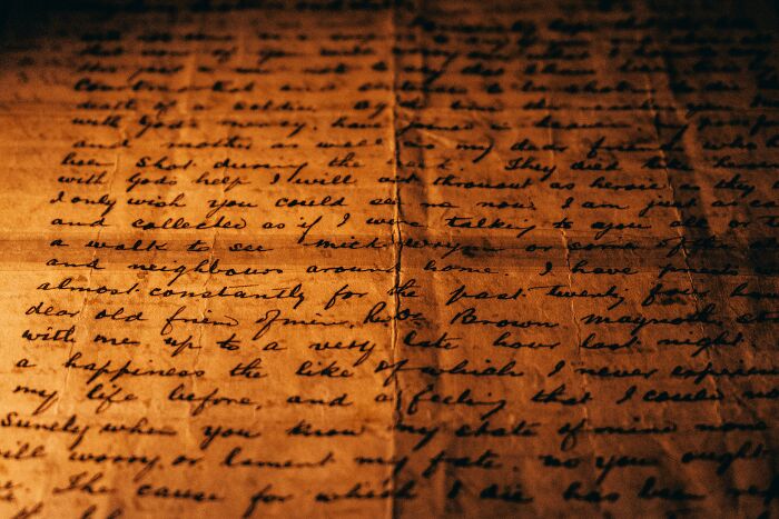 Faded handwritten historical document with cursive text, related to true-or-false history questions about the past.