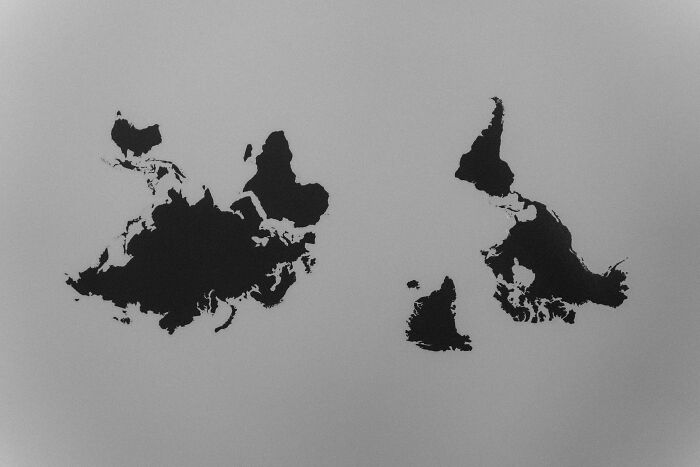 Black silhouettes of flipped countries shown side by side on a gray background for geography fans to identify.