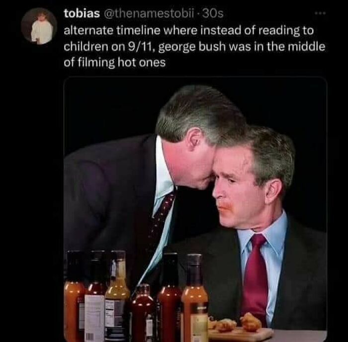 Two men at a table with hot sauce bottles, an alternate timeline moment that makes people go hmmm and share it.