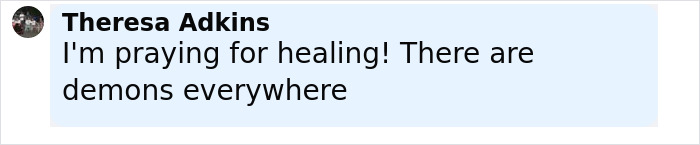 Comment text on a light blue background showing a prayer for healing and mention of demons everywhere by Theresa Adkins.
