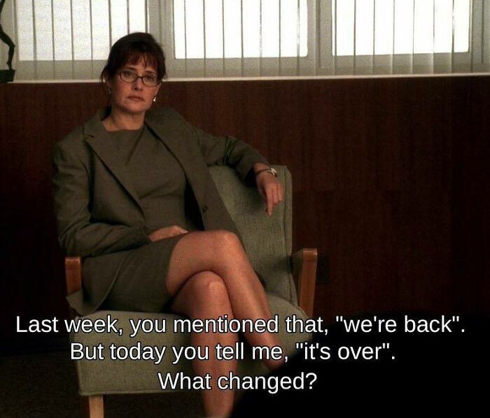 Woman sitting in chair with text overlay about conflicting statements, a curious moment that made people go hmm.