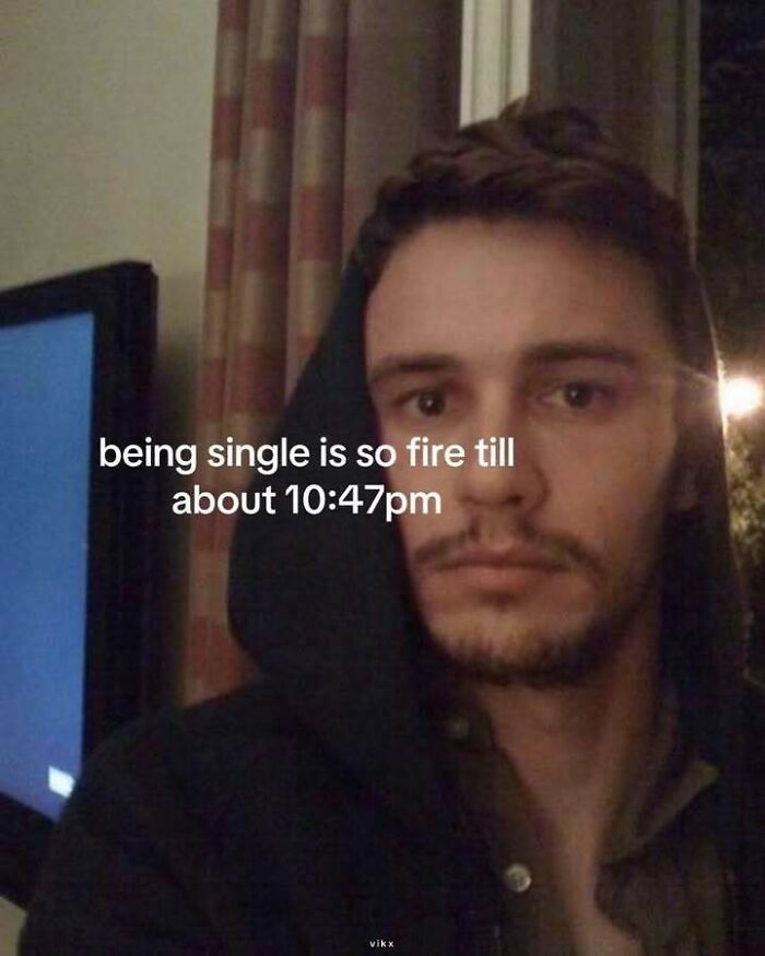 Young man in hoodie with text about being single sharing a moment that made people go hmm in new pics.