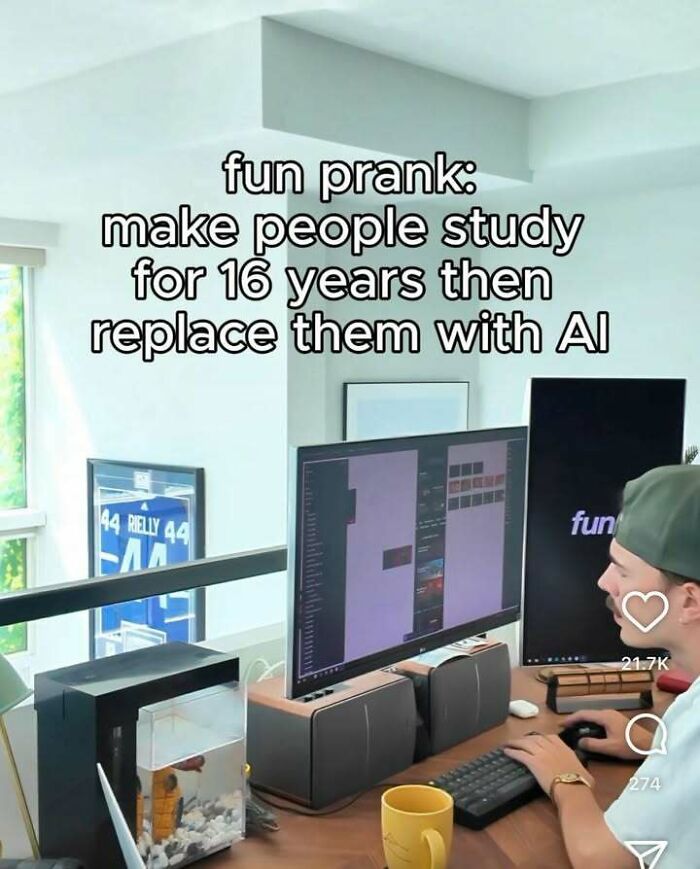 Person working at a dual monitor desk setup with a humorous prank text, part of people seeing something that made them go hmmm.