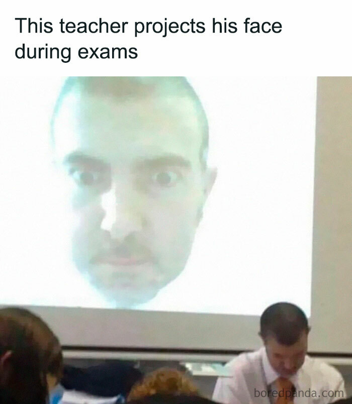 Teacher projecting his face on screen during exams in classroom setting, showcasing physics is fun meme to keep brain sharp and witty.